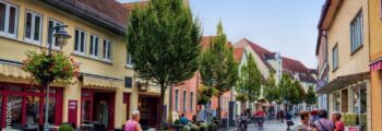 Beja - Ville historique et campagne ensoleillée en arrière-plan.